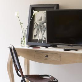 Desk and tv in hotel room